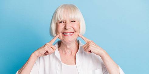 Woman smiling with dentures